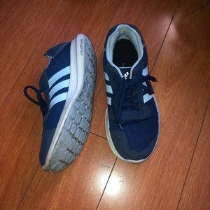 Blue adidas running shoes